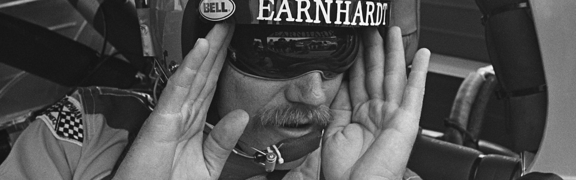 Dale Earnhardt communicates with his pit crew at Bristol Motor Speedway.